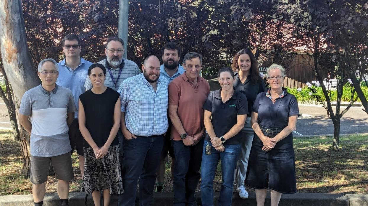 Andrew Swan (third from right in front row) with some AGBU team members behind a combined LAMBPLAN evaluation